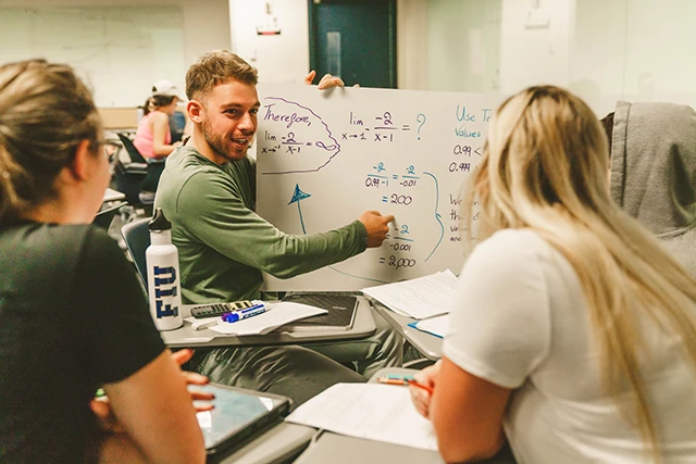 FIU students study calculus in an active learning environment