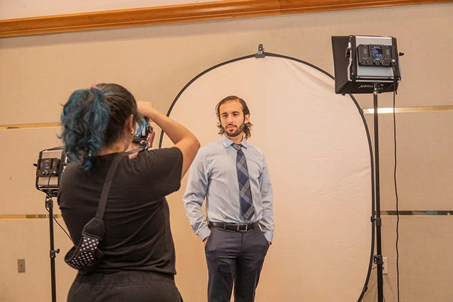 Students gets a portrait taken