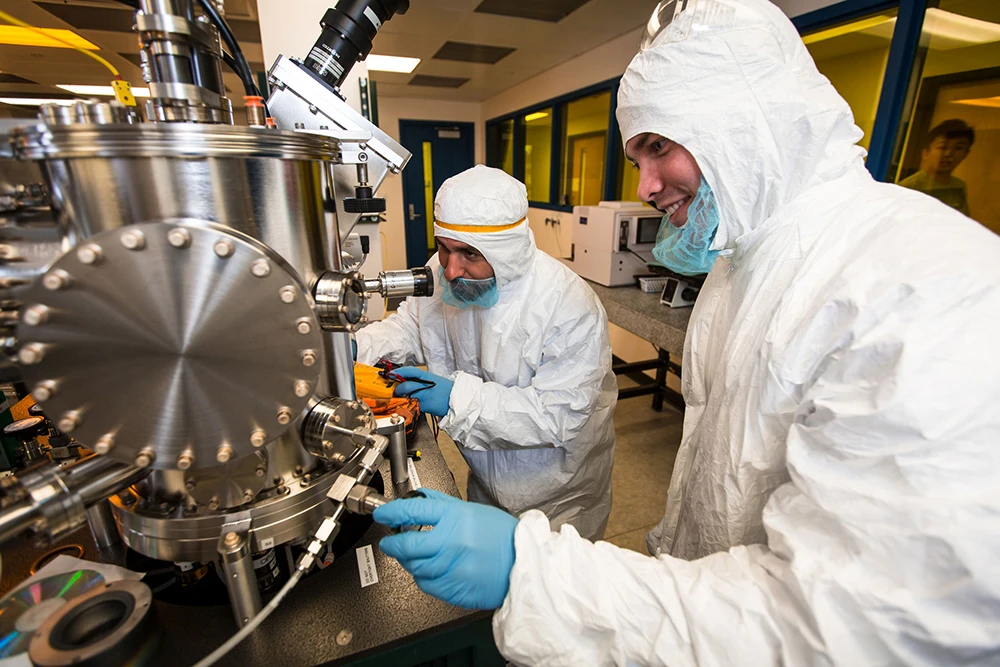 Researchers working in an ECE lab