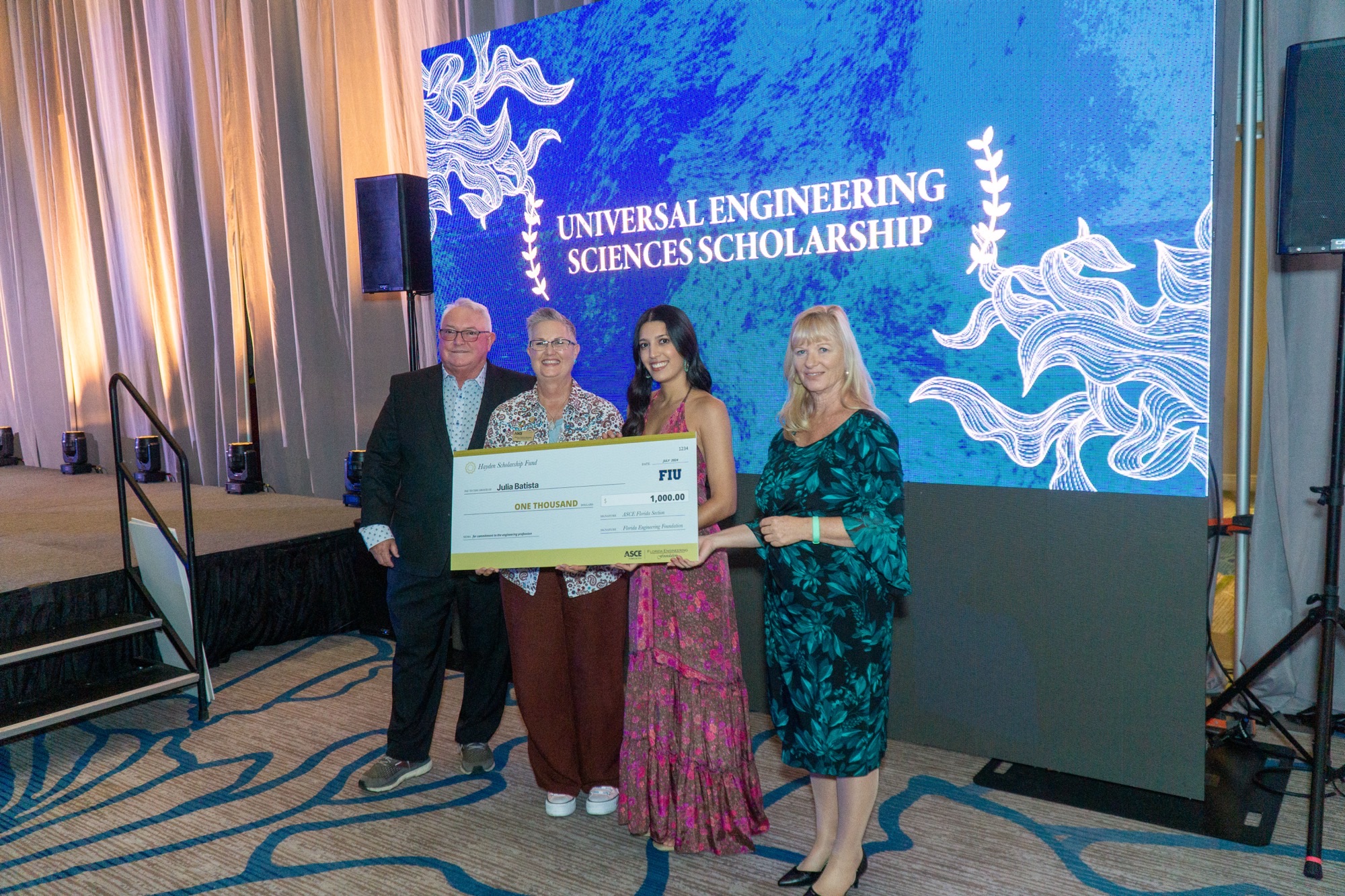 Julia Batista accepting of the Hayden Scholarship Fund