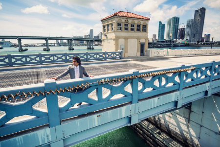 A man standing on a bridge